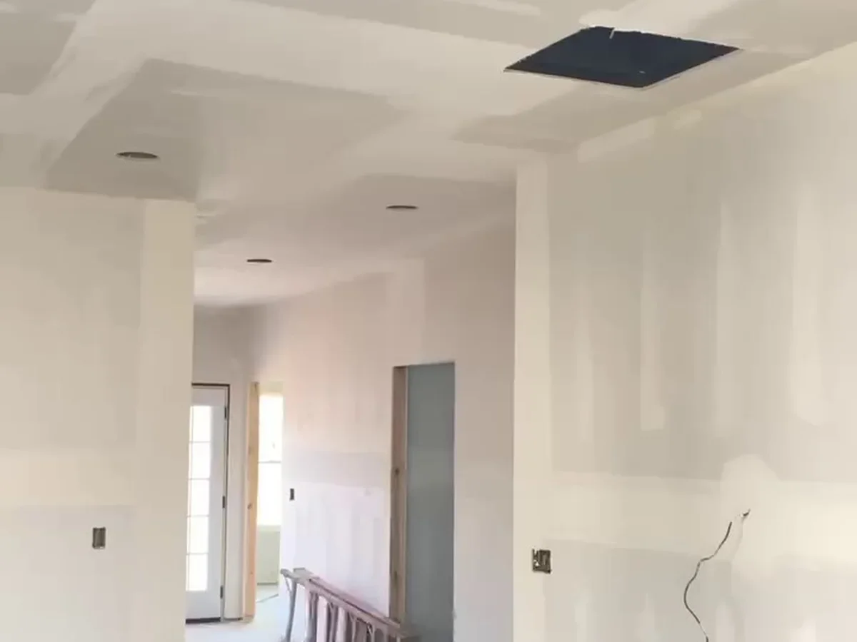 Large open room hung and taped in a new house